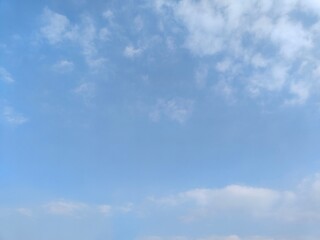 Wall Mural - azure sky with fleeting clouds. a clear blue sky with a few wispy clouds, soft lighting, high - reso