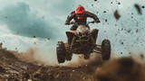 Person riding a quad bike, all-terrain vehicle (ATV). Squad biking motorcycle jump. Four wheelers ATV mud riding. Quad wheel motorized off-road vehicle. Desert race mudding ATV mountains jump