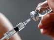 © Thee - Sharp focus on needle entering skin for vaccination - stick immunocompromised shot