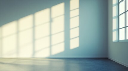 Aufkleber - Empty room with sunlight casting shadows on a wall