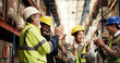 © peopleimages.com - People, applause and team at warehouse, logistics and smile with support for woman, celebration and promotion. Group, engineer and men with goals, thank you and praise with shipping at storage plant