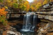 © Maryna - Colorful Nature. Beautiful Waterfall at Autumn Forest in Fall Season Landscape
