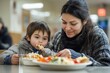 © Tetiana Kasatkina - Tender moment in crisis meal center