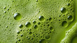 © agungai - green matcha tea with frothy microfoam, a macro and full-frame texture shot, close-up texture, top view