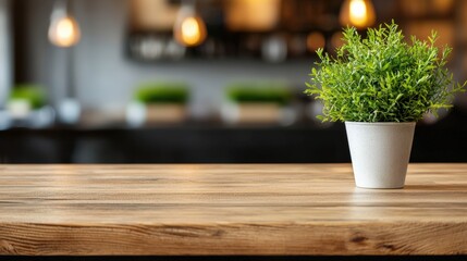 Poster - Empty polished wood counter with plant in a blurred restaurant setting