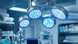 © Sawat - Overhead lighting system illuminating surgical robot prepared for use