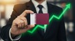 © Firman Dasmir - Qatar's Economic Growth: A Businessman Showcasing Positive Financial Trends