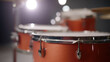 © Mind - Vibrant drum set with glossy finish under bright lights
