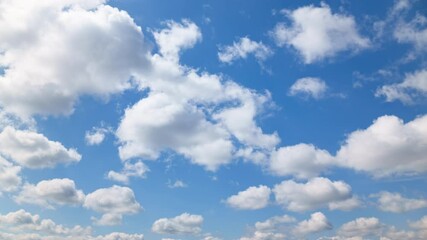 Wall Mural - beautiful blue sky with soft white clouds timelapse for abstract background