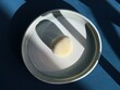 © RooM The Agency - Overhead view of a single Mochi Dessert on a chair in the sunlight
