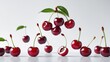 © Rizvan - Cherry plummeting through the air on a white surface. Concept of food in zero gravity. High definition image