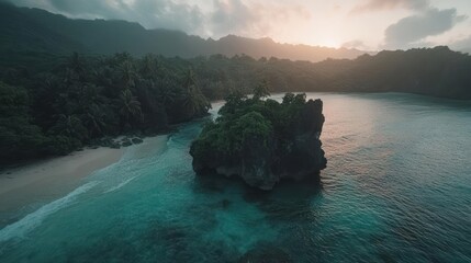 Poster - A captivating drone shot reveals a rocky island surrounded by calm, blue-green water, bordered by a sandy beach and lush green forest, beneath a cloudy sky with a soft sunset glow, showcasing a