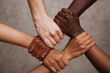 © newlifestock - Unity and collaboration are visual metaphors for ethical messaging as diverse hands come together to symbolize strength and solidarity