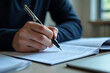 © MRSUTIN - Writing a professional report home office document creation quiet room close-up productivity
