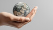 © FANGWORLD - Gently Holding Our World A Realistic Hand Protecting the Miniature Earth