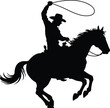 © designx - Classic Cowboy on Rearing Horse with Lasso Western Vector