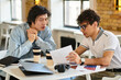 © Bliss - Collaborative brainstorming session in a modern office setting during the afternoon