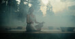 © Gorodenkoff - Female Yogi Performing a Spiritual Ritual with Smoke, Incenses and Singing Bowls, Cleansing Her Body and Soul, Doing Mindfulness Meditation and Breathing Exercises Outdoors in a Tranquil Forest