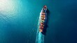 © suyu - Top down aerial view of large cargo container ship sailing in open ocean. Concept of global transport, sea freight logistics, maritime trade, export import and commercial shipping route