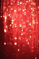 Wall Mural - Glimmering Red Light Reflection Background with Shimmering Bokeh