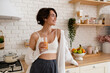 © mary_markevich - young pretty woman cooking at home, morning kitchen, healthy food