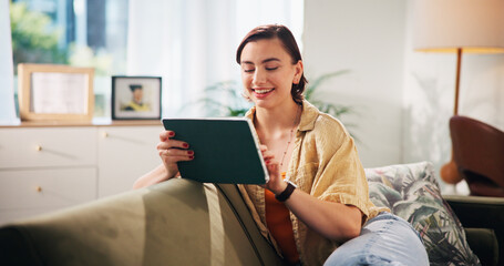 Poster - Woman, smile and tablet on sofa, relax and streaming with funny video in living room at apartment. Girl, person and digital touchscreen with app, movie subscription and happy for social media in home