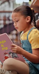 Poster - Kid, reading and book on floor in library for knowledge, fantasy story and language development. Student, studying and literacy novel of academic growth, literature and information of education hobby