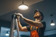 © Алена Ваторина - Electrician on ladder installing ceiling light in modern interior with focused expression