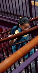 Poster - Child, student and walking on stairs at library for knowledge, above or learning. Backpack, elementary or academic journey with kid for childhood development, education books or novels for school