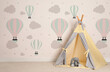 © New Africa - Cozy children's room with play tent and cute wallpaper. Stylish playroom interior