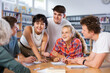 © JackF - Team of diligent schoolkids during classes in school library