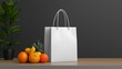 © supatthanan - White Shopping Bag Display with Ripe Fruits on Wooden Table in Studio Setting