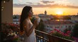 © mr. arsad - a beautful cheerful girl enjoy sunset view with a cup of coffee or tea on her hand from balcony