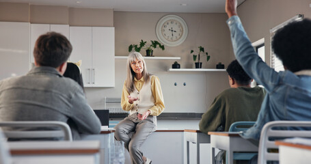 Aufkleber - Teacher, woman and students with answer in classroom for lesson question, teaching solution or knowledge. People, educator and learners in high school with hands raised, learning opinion or education