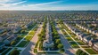 © Shadaw - Aerial view of a sprawling residential neighborhood with a mix of single-family homes, townhouses