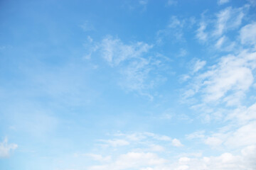 Wall Mural - blue sky background and white clouds soft focus, space in the middle, horizontal shape.