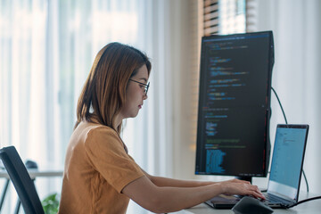 asian tech professional creating digital applications, combining innovation, intelligence, and exper