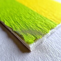 Poster - Abstract Green and Yellow Texture with a White Base on a Textured White Surface, Perspective View