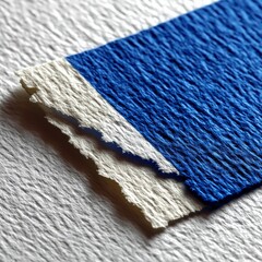 Poster - Textured Harmony: A Macro View of Blue and White Crepe Paper Intertwined in Light and Shadow.