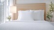 © PT CINTA SEJATI - Simple, clean bedroom interior with white bedding and wooden headboard.  Soft lighting and fresh decor