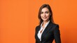 © ksuklein - woman with business attire on orange background . Female in office outfit