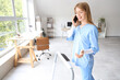 © Pixel-Shot - Female doctor talking by mobile phone on treadmill in clinic