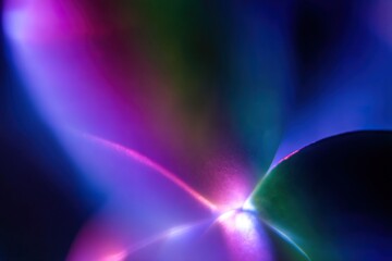 Wall Mural - abstract blurred texture with light effects in violet, pink, blue, and green