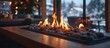 © indirah - Cozy cafe fire pit, winter scene