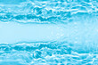 © Water 💧 Shining 📸 - Blue water with ripples on the surface. Defocus blurred transparent blue colored clear calm water surface texture with splashes and bubbles. Water waves with shining pattern texture background.