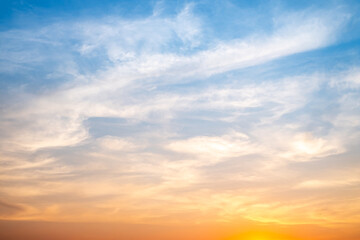 Wall Mural - beautiful , luxury soft gradient orange gold clouds and sunlight on the blue sky perfect for the bac