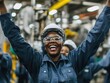 © CaptureCollabStudios - Team members display excitement and joy in an industrial setting