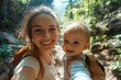 © Infinity Gallery - Young mom with baby boy travelling. Mother on hiking adventure with child, family trip in mountains. National Park. Hike with children. Active summer holidays. Fisheye