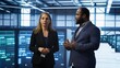 © DC Studio - Team of admins in high tech data center looking at hologram visualization. Engineer and coworker working on securing serves using AR tech, preventing hacker attacks, camera A