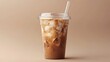 © Maule - A transparent iced coffee drink with a lid and straw.